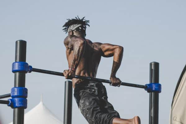 man in pull up bar